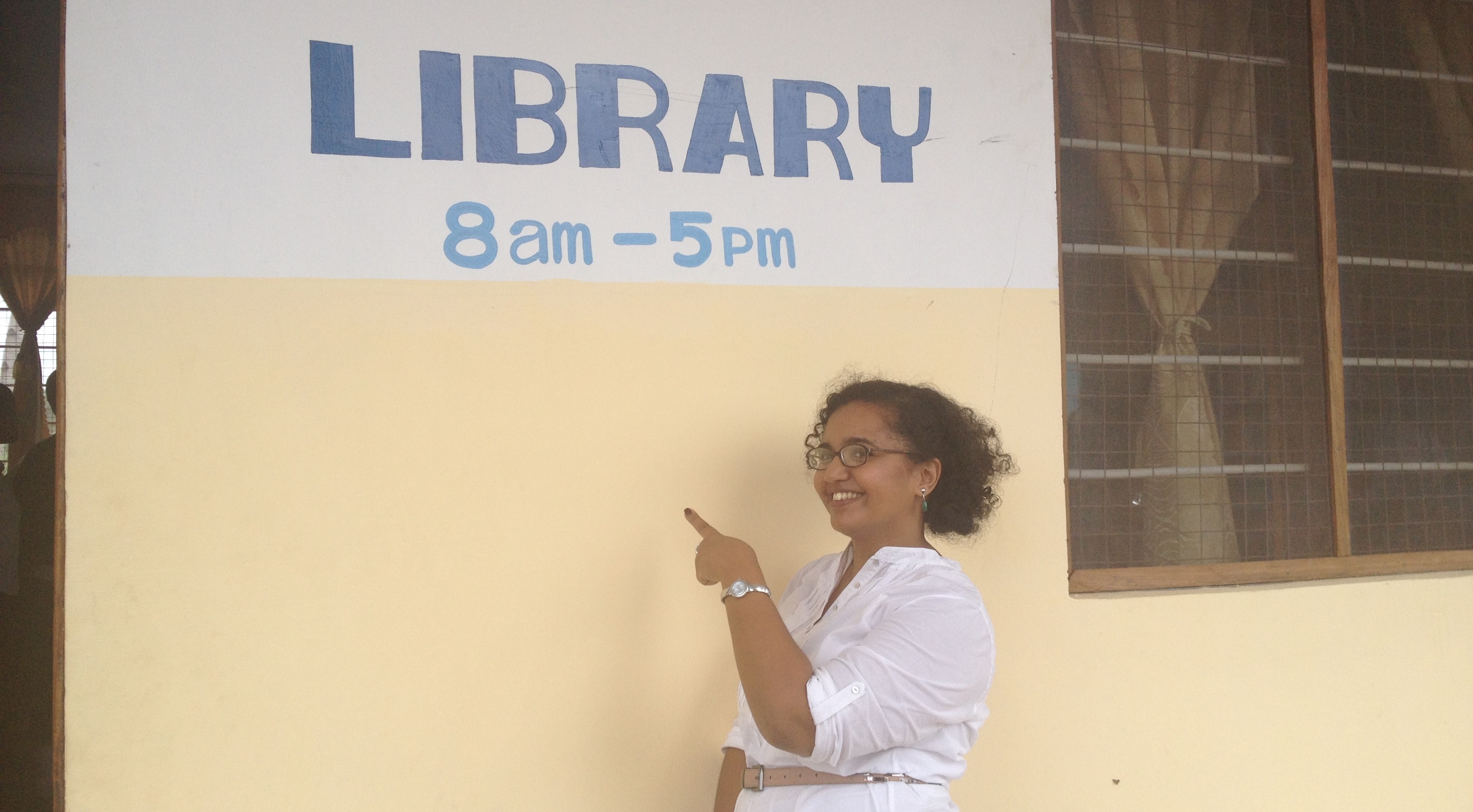Montse outside the new library at Kinyerezi Secondary School