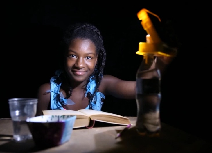 WakaWaka Light - girl, night reading, high res