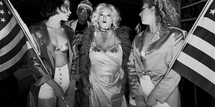 Dixie Evans, 71, a former burlesque dancer and the proprietor of the Burlesque Hall of Fame and Historical Museum, prepares to hit the stage at the 41st Annual Striptease Reunion and Miss Exotic World Contest. (Helendale, CA, 1998)