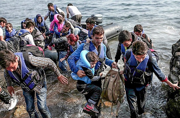 Syrian refugees debarking at Lesbos, Greece. Photo courtesy Freedom House. 