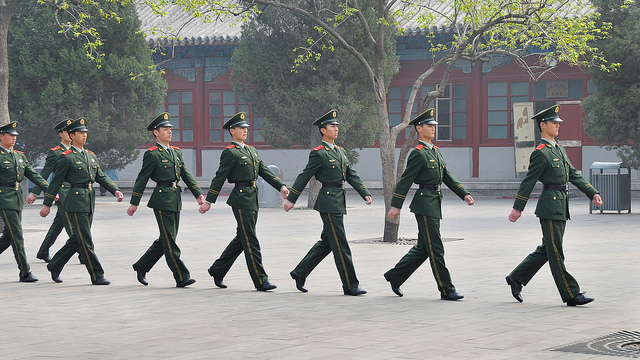Chinese soldiers at Tiananmen square. The PLA has regularly infiltrated Western servers since 2001. Photo courtesy of Peter M. via Flickr. 