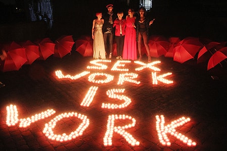 sex work ROME, ITALY - APRIL 30: Sex workers seen during a demonstration for the legalization of sex as work near the Colosseum on April 30, 2015 in Rome, Italy. PHOTOGRAPH BY Marco Ravagli / Barcroft Media (Photo credit should read Marco Ravagli / Barcroft Media via Getty Images)