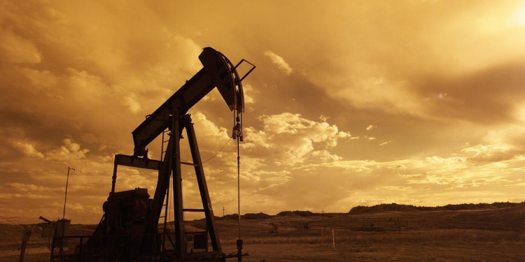 oil-pump-jack-sunset-clouds-silhouette-impakter-trump-madman-threory-imperialism