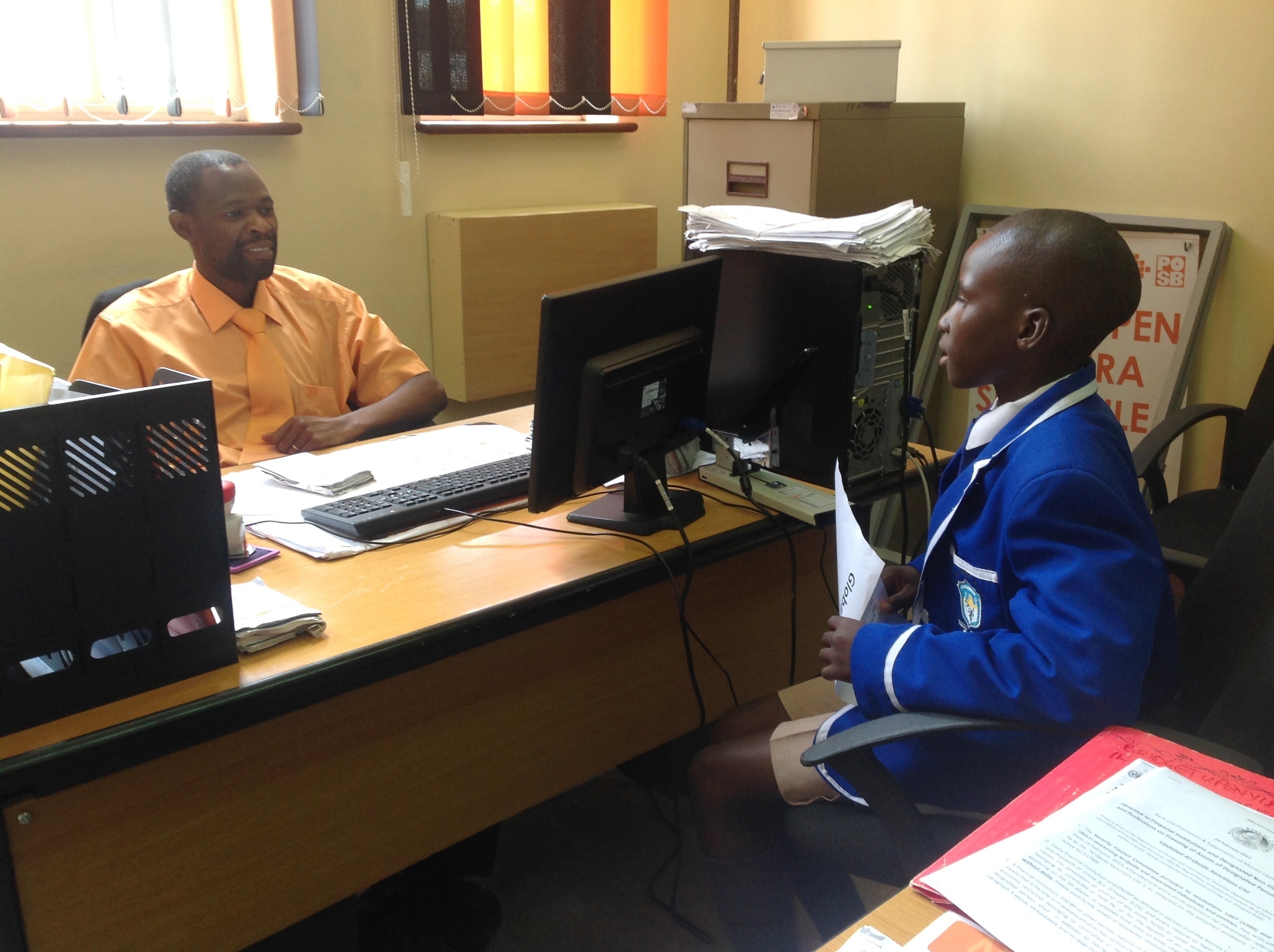 Insert_ZimbabweBoywBank