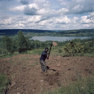 Single mum Espérence Ndayishimiye (26) would like to grow cassava on the small plot of land in front of her house to help feed her two children, but it is rocky and not fertile. Photo: Chris de Bode/Panos Pictures for Concern Worldwide