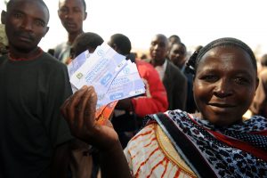 05 September 2012, Chamwino, Tanzania - Input trade fair hosted by the Chamwino District council and facilitated by FAO. For the first time 400 farmers from 5 villages were granted trade vouchers by FAO that enabled them to purchase the quality declared seeds and farm equipment from the agro dealers at the trade fair. A series of droughts in central Tanzania has challenged the food security of rural farmers and reduced the availability of quality seeds and crop varieties, increasing the level of poverty in the region. In response, The Food and Agriculture Organization (FAO) launched the Disaster Response and Preparedness to Drought project, funded by DFID, to provide the basic stock of quality declared seeds and support the farmers groups. By using seed-based response mechanisms and good agricultural practices, FAO and DFID are enhancing the capacity of farming communities to prepare for and respond to climate variability. FAO Project: OSRO/URT/001/UK - Emergency supply of maize seeds to drought-affected farmers in Tanzania /(New phase) Disaster Response and Preparedness to Drought. - 2012. Objectives: The general objective of this project is to provide emergency seed support to farming families in 34 districts affected by drought in order to avert food insecurity and possible starvation. The specific objective of this project is to distribute a total of 1 592 tonnes of seed to 159 200 food insecure households to cover an estimated 64 427 hectares of land with an expected yield of 96 640 tonnes of maize.