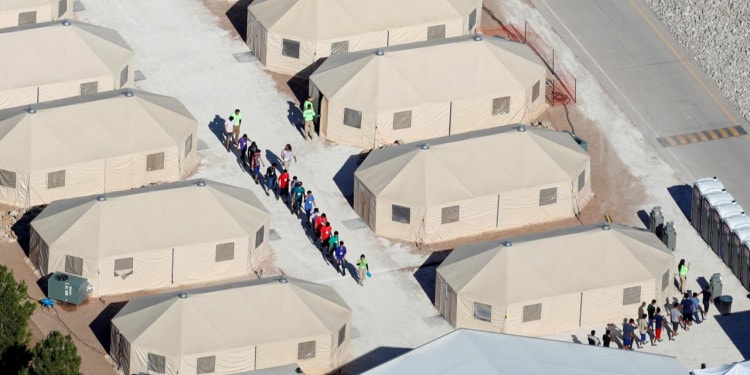 Immigrant children, many of whom have been separated from their parents under a new "zero tolerance" policy by the Trump administration, are being housed in tents next to the Mexican border in Tornillo, Texas, U.S. June 18, 2018.        REUTERS/Mike Blake