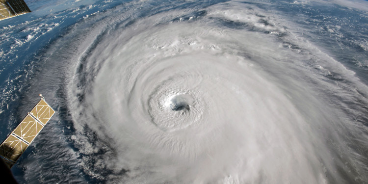 IN SPACE - SEPTEMBER 12:  In this NASA handout image taken from aboard the International Space Station, shows Hurricane Florence as it travels west in the Atlantic Ocean off the coast of the U.S. on September 12, 2018. Coastal cities in North Carolina, South Carolina and Virginia are under evacuation orders as the Category 2 hurricane approaches the United States. (Photo by NASA via Getty Images)