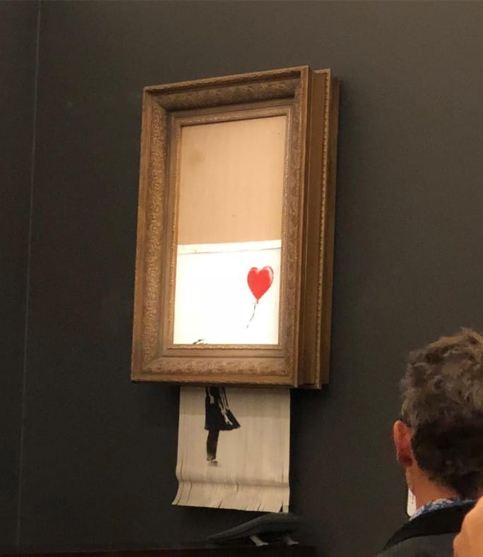Going, Going, Gone…Banksy Self-Destructs and Shakes the Art World