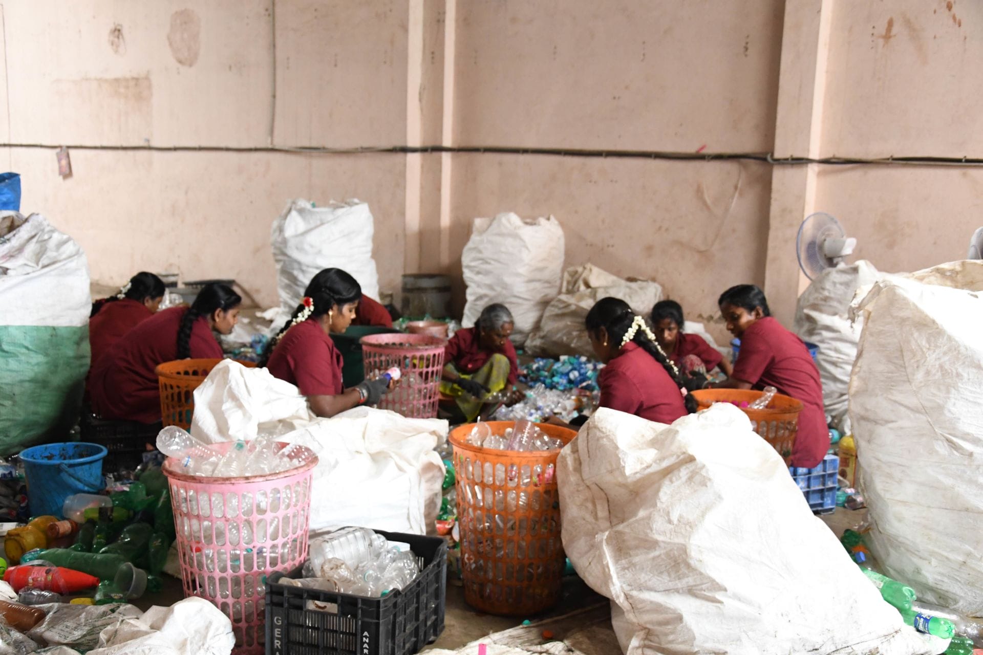 Women sorting plastic