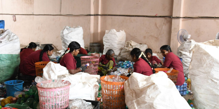 Women sorting plastic