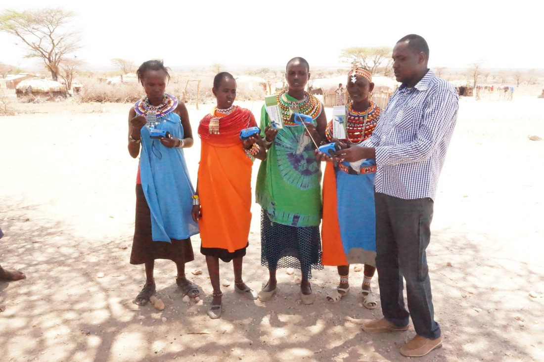 Samuel Leadismo with Samburu girls in his workshop