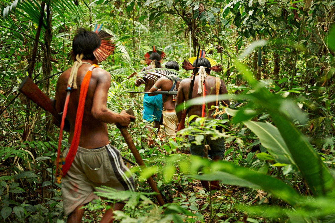 Men from Kayapo, an indigenous tribe living in the Amazon rainforest and fight against development and deforestation of the area.