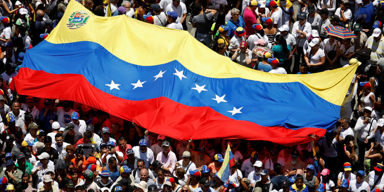 Venezuelan protest with country flag