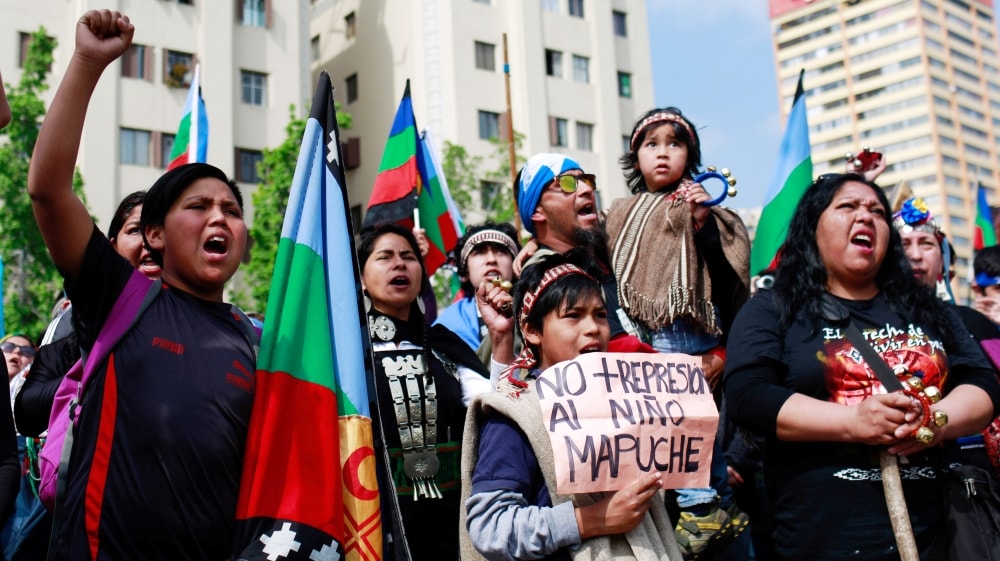 Mapuche protesters defending their right to their land.