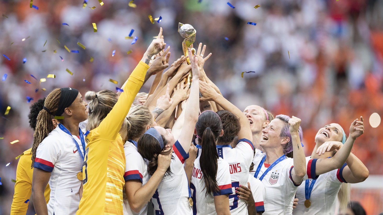 USNWT players celebrate with the FIFA 2019 Women's World Cup