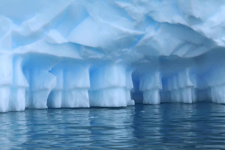 Warming is resulting in ice loss, including melting underneath glaciers. 