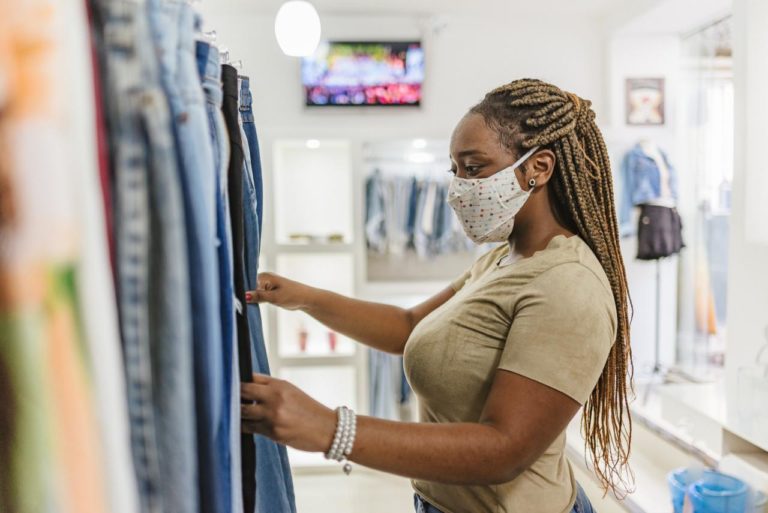 Woman clothes shopping covid
