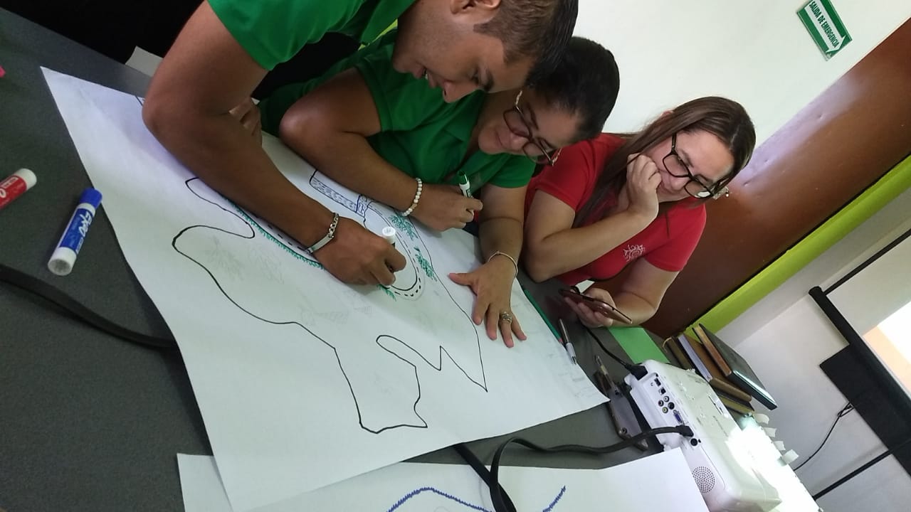 Photo from a Root Capital climate resilience training at AMPROCAL before the COVID-19 pandemic