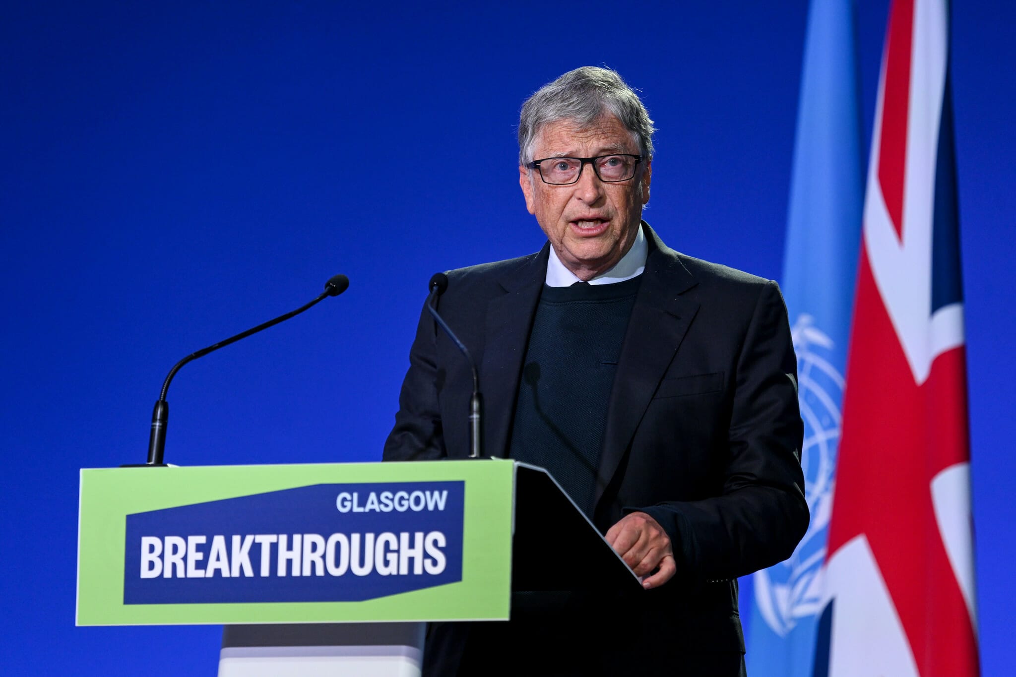 Man speaking whilst standing