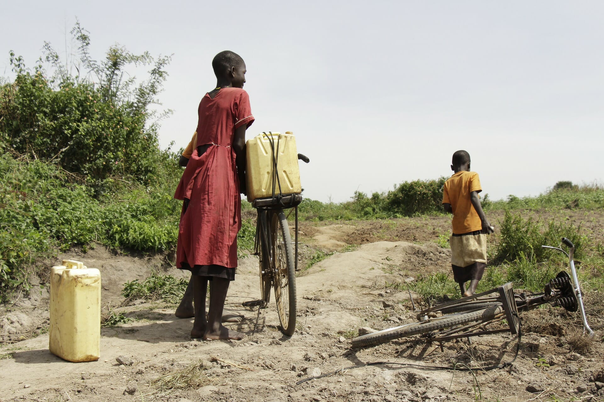women in Africa getting water
