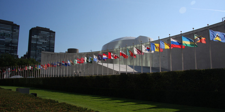 In the Photo: Flags outside the United Nations headquarters, New York
Photo Credit: Wikimedia Commons