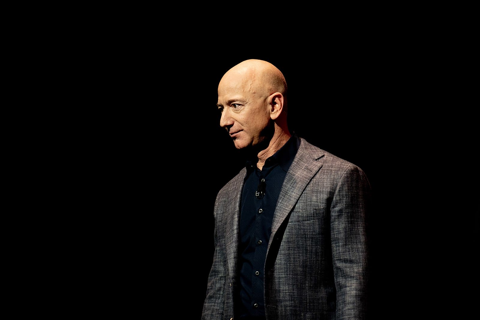 Bezos Pledges to Donate His Fortune While Amazon Lays off Workers