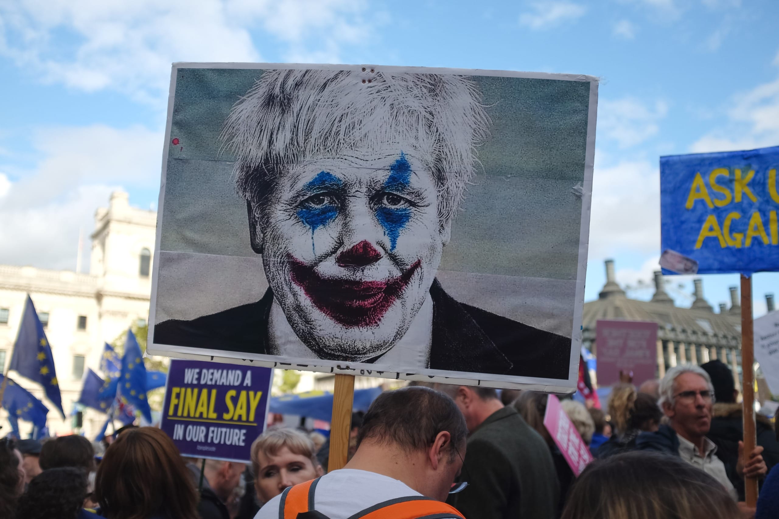 A picture of Boris Johnson dressed up as the joker, meant to symbolise the foolish way he led the UK into the economic downturn which has caused strikes