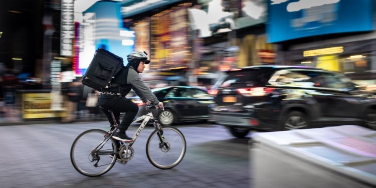 rider on bike last mile delivery example