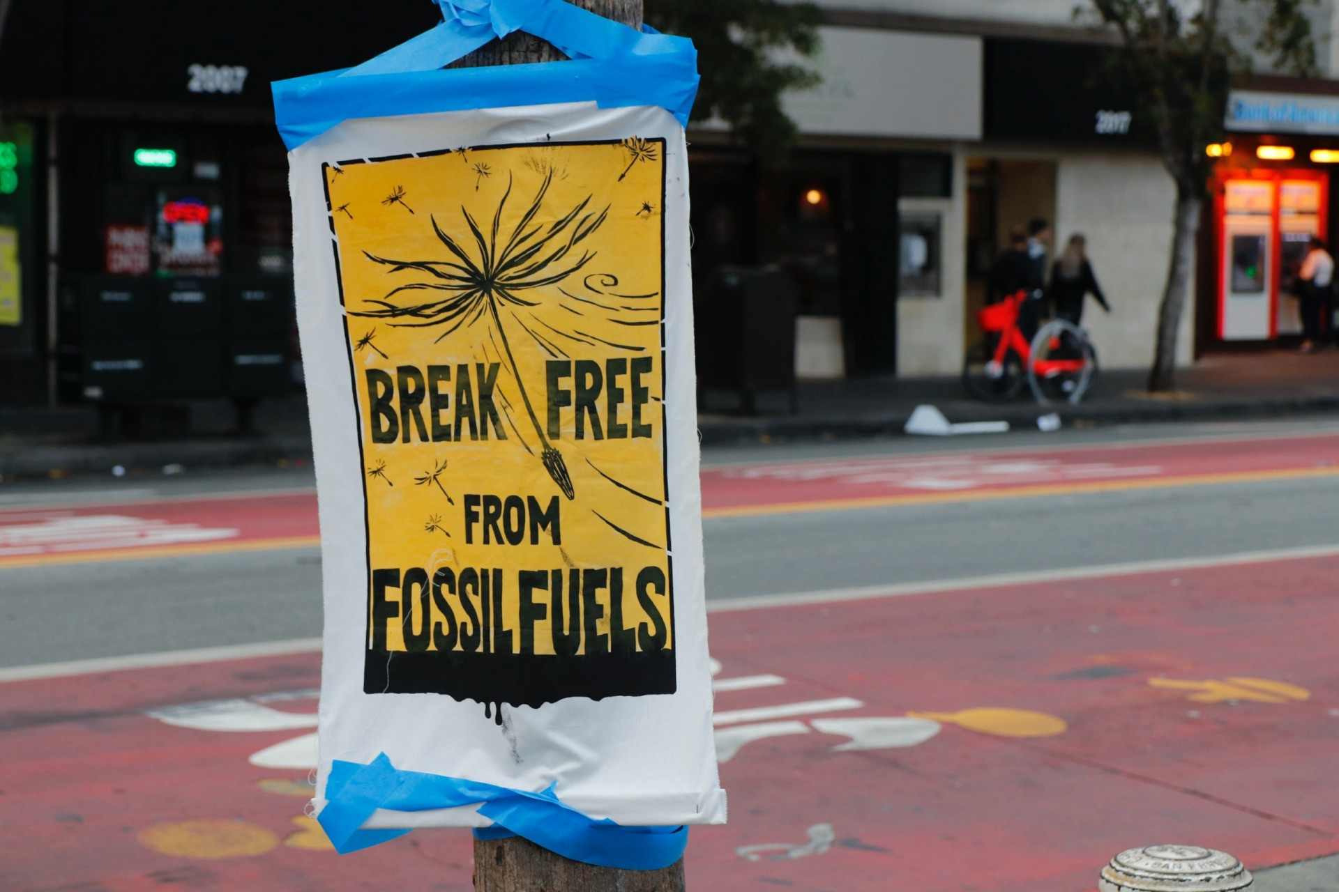 A poster saying "Break Free From Fossil Fuels"
