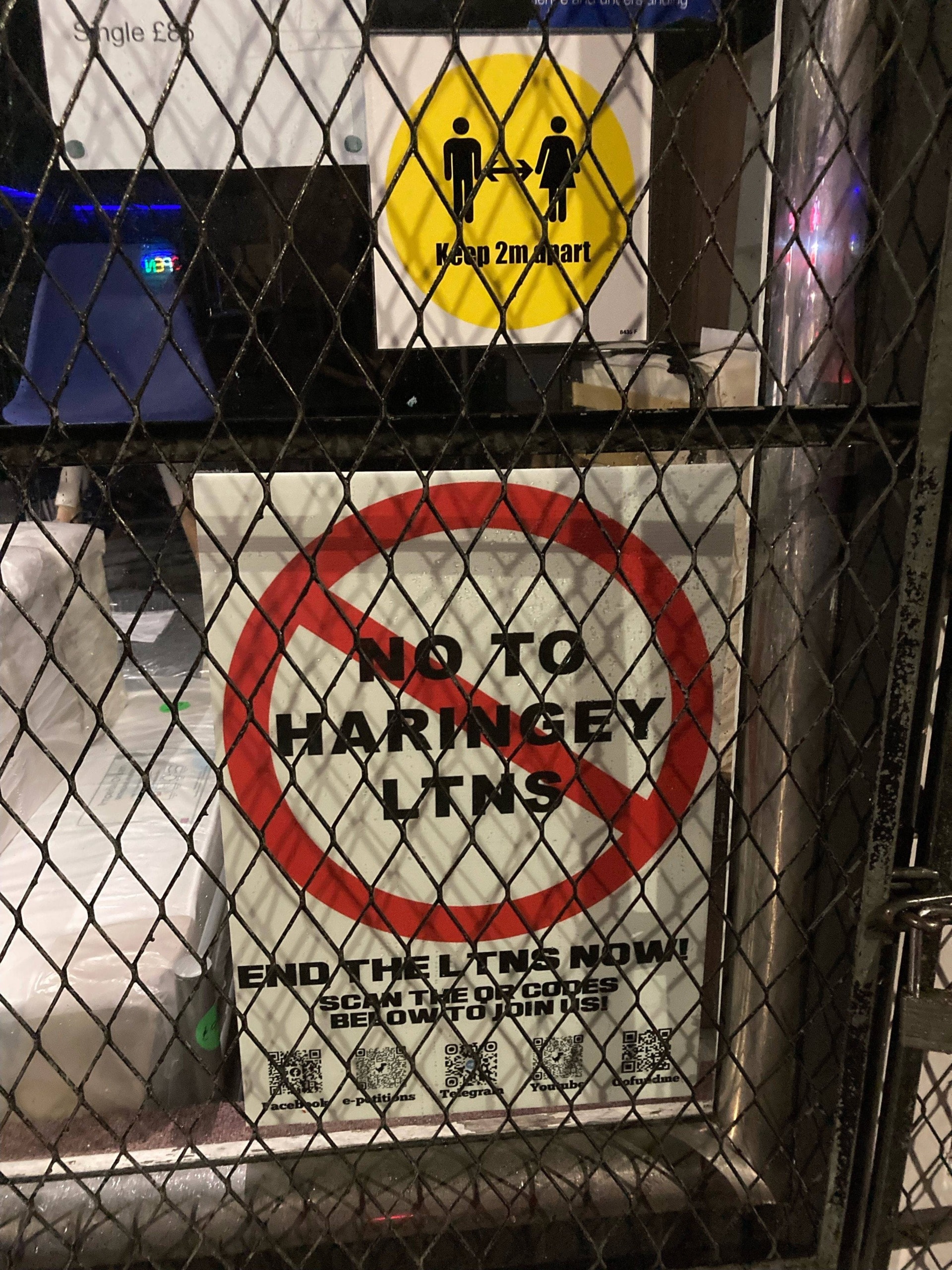 A photo displayed in a shop window saying "No to Haringey LTNS"