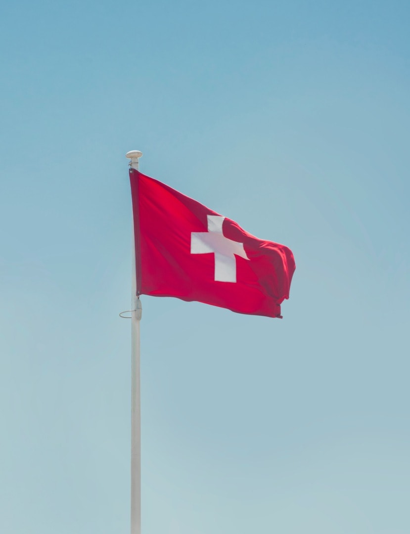ESG news regarding Switzerland setting 2035 emissions target, new cargo ship captures CO2, Blueleaf and Jackson Green partner, Meta explands green energy portfolio