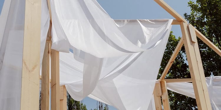 Young designers presenting sustainable prototypes at Creathon 2025 in Almaty’s Botanical Garden.