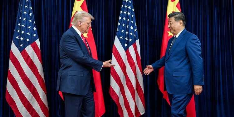 US President Donald Trump greets Chinese President Xi Jinping