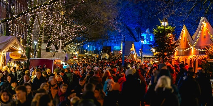 Christmas consumerism: crowds gather at Christmas market