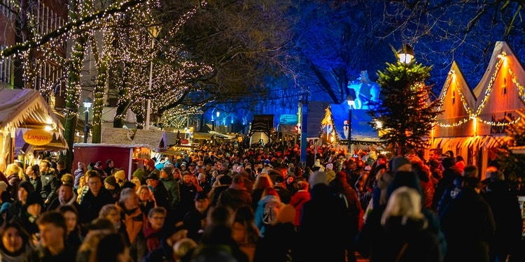 Christmas consumerism: crowds gather at Christmas market