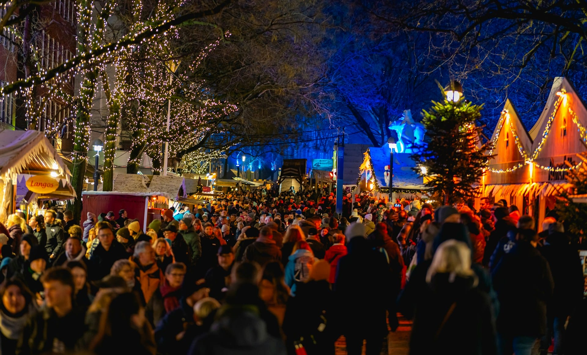 Christmas consumerism: crowds gather at Christmas market