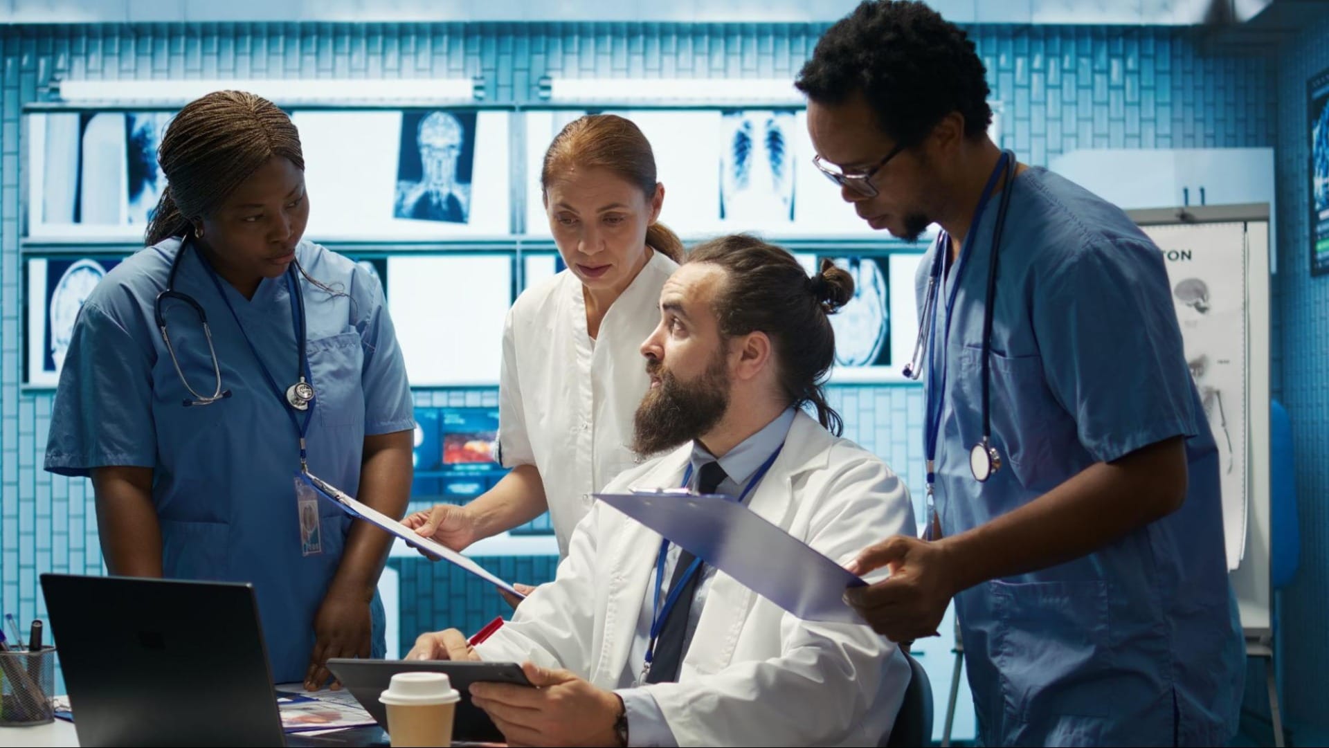 Health Challenges with Smarter Education and Training  - Trainees consulting their peer.