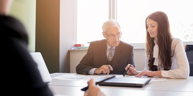Defense attorney and Legal Specialists at work.