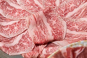 ESG News regarding global markets declining due to geopolitical tensions and U.S. tariffs, Trump threatening 200% tariffs on French wine, EU meat VAT reform cutting carbon footprint, Inpex resubmitting environmental plan for a project in Australia 