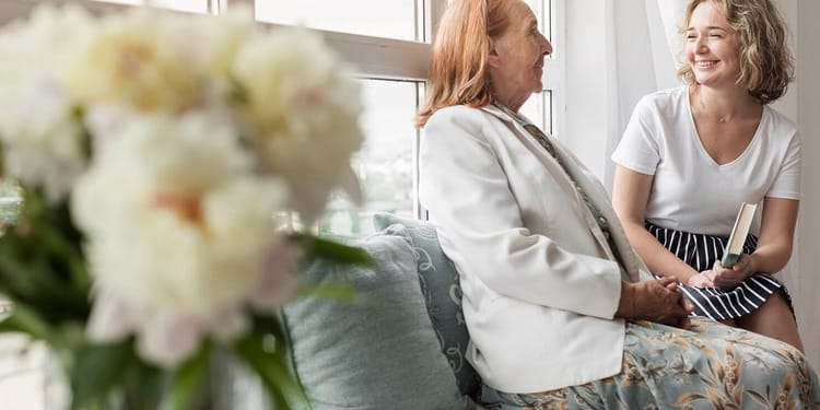 Mother and daughter handling assisted living