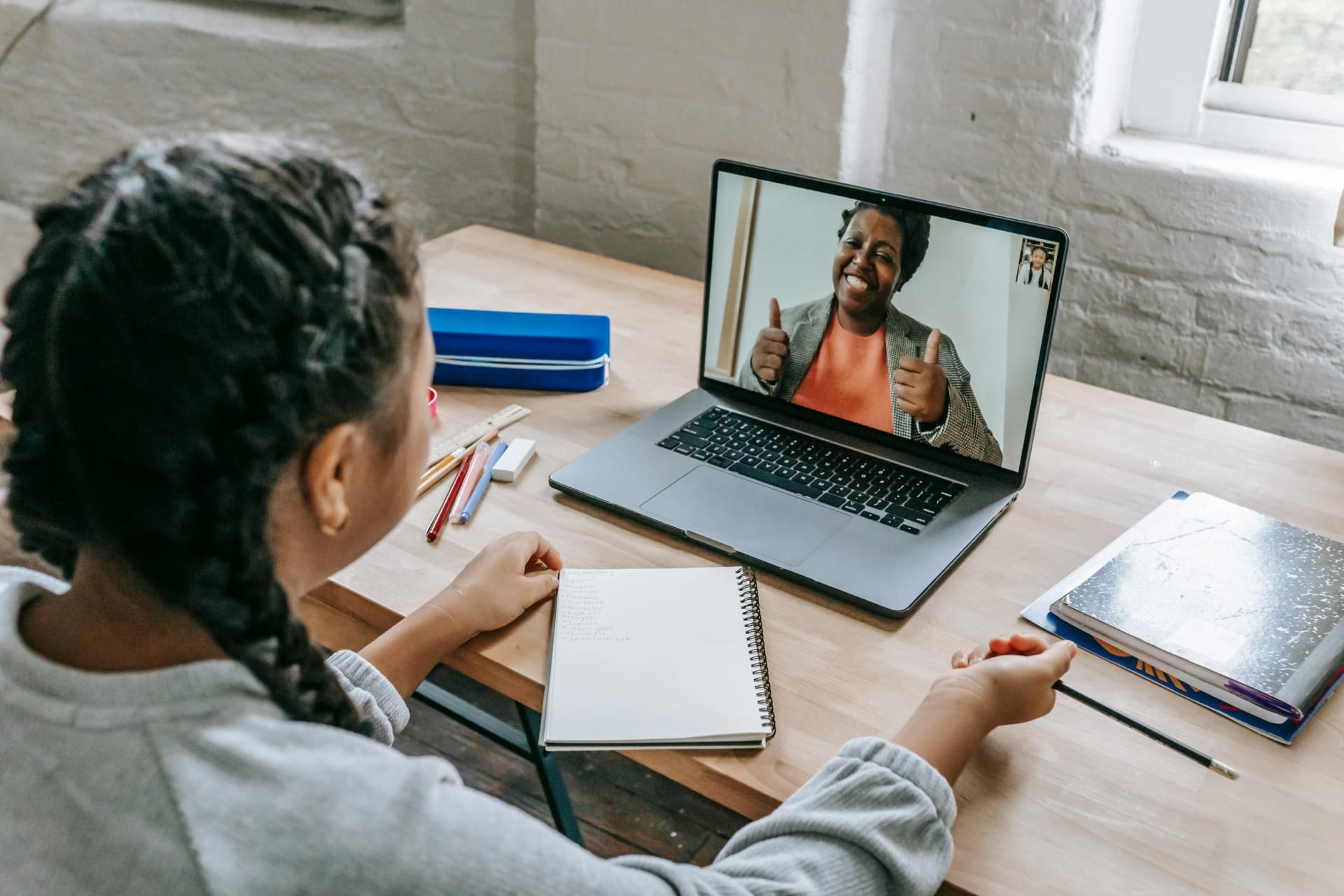 Personalised learning: a girl learning through dedicated video call