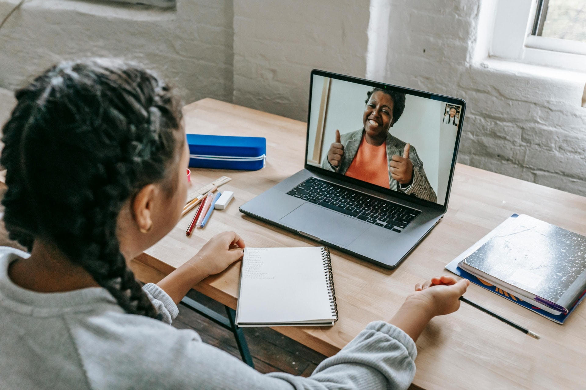 Personalised learning: a girl learning through dedicated video call