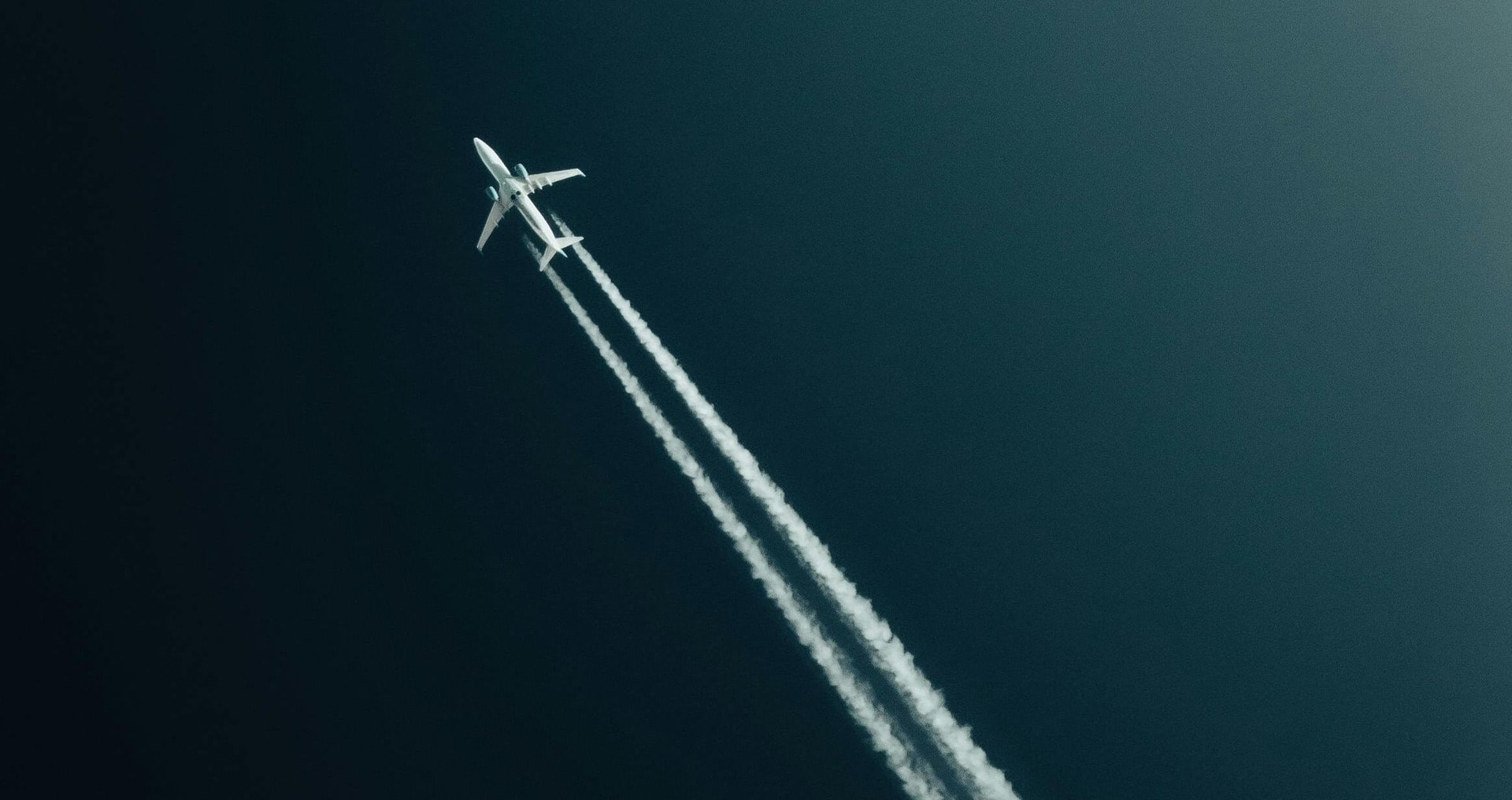 How Airlines Could Cut Emissions in Half Without Flying Less